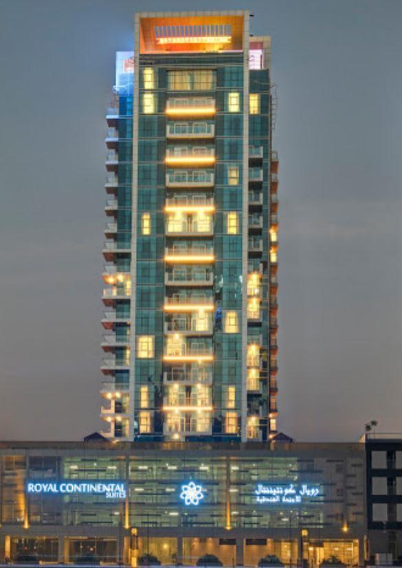 Royal Continental Suites Business Bay Dubai Exterior photo The building at night