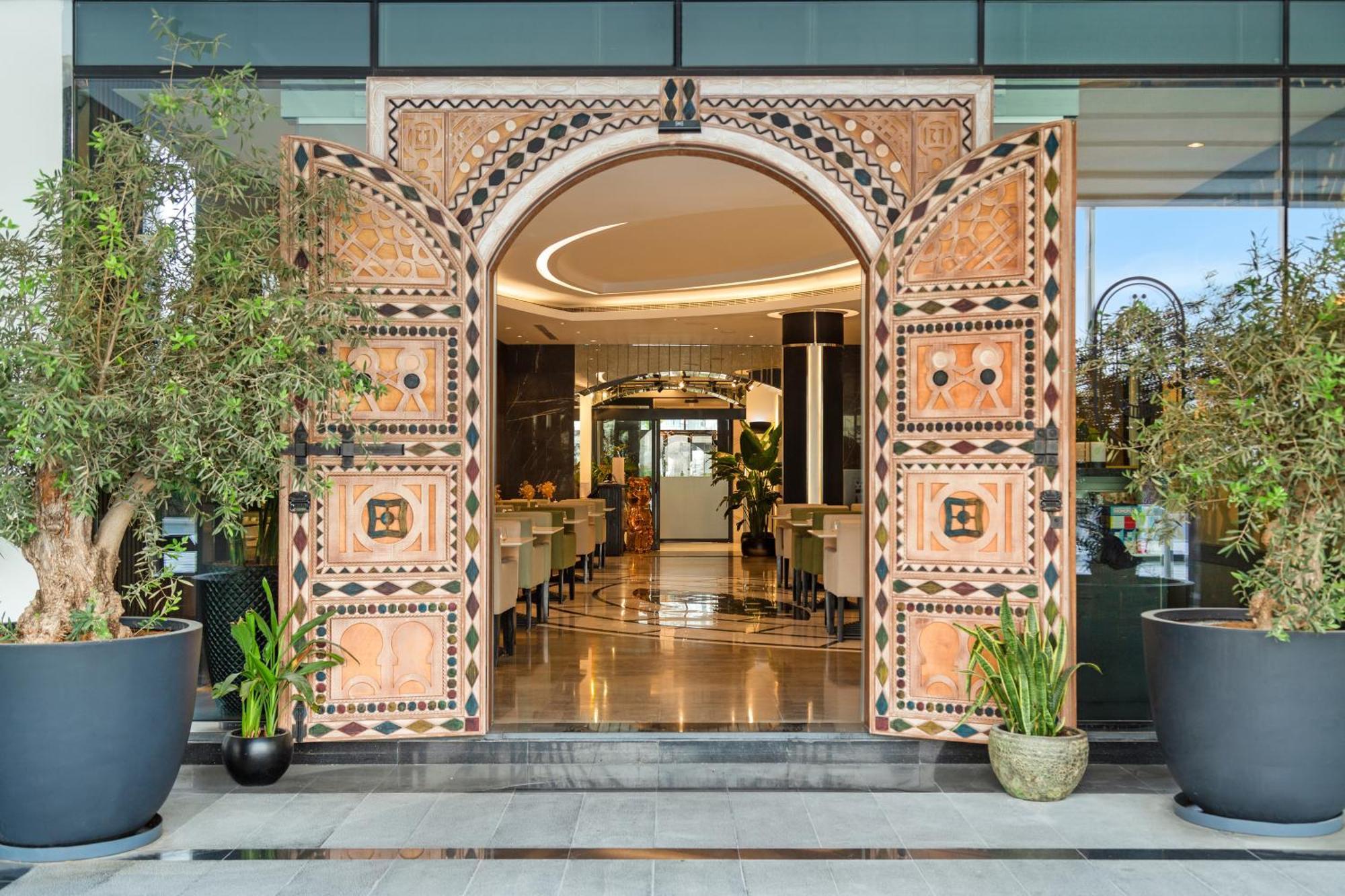 Royal Continental Suites Business Bay Dubai Exterior photo Entrance to the hotel