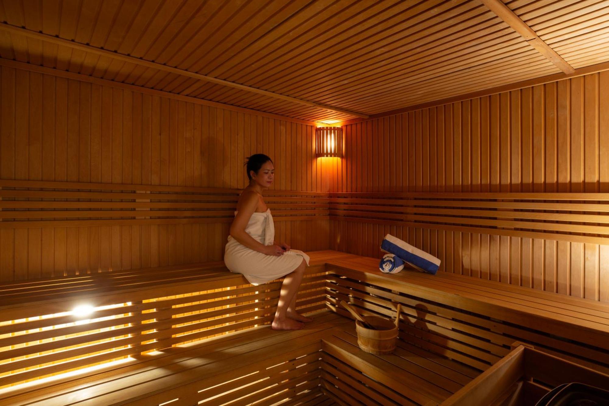 Royal Continental Suites Business Bay Dubai Exterior photo A woman in a sauna
