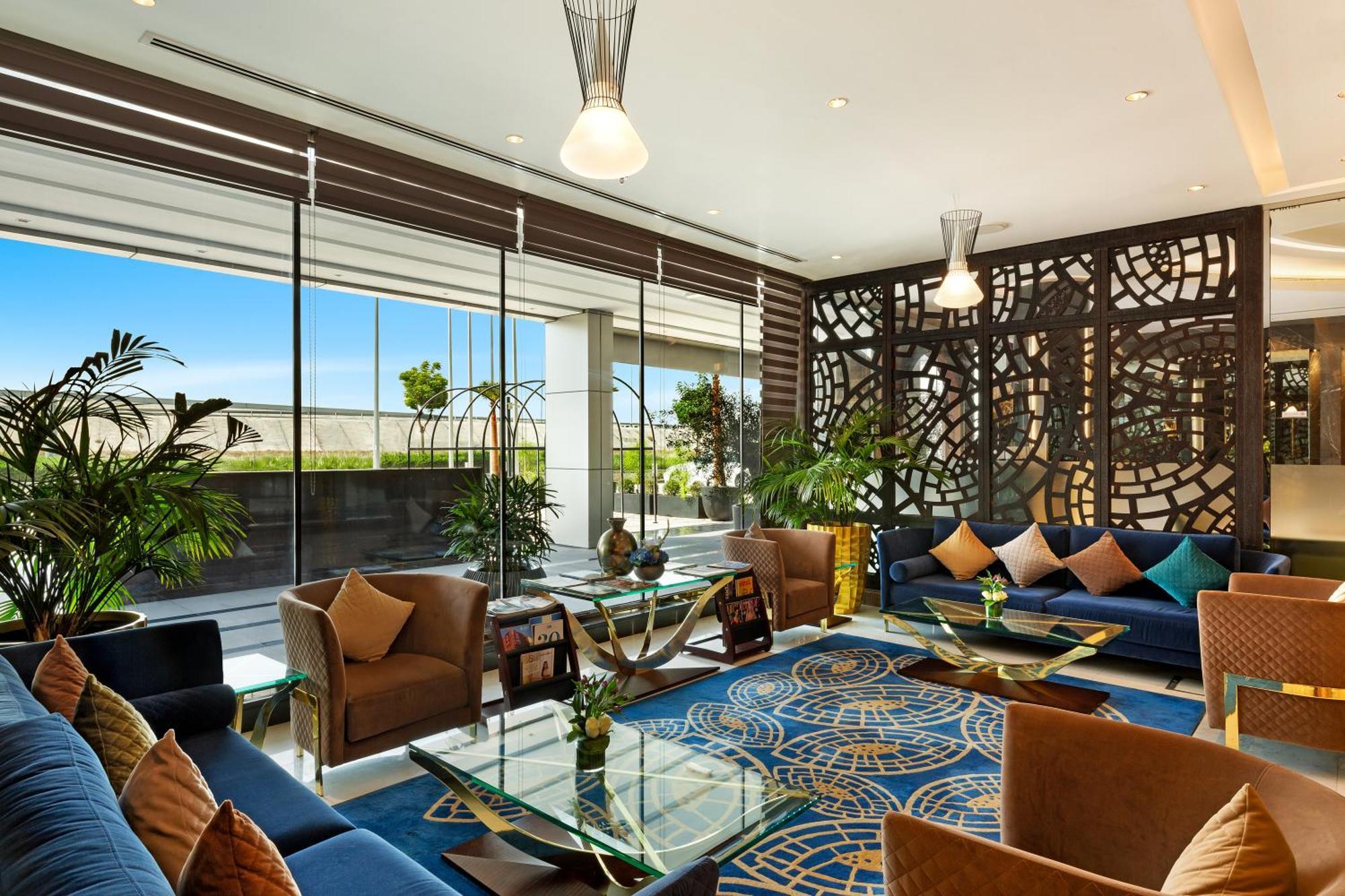 Royal Continental Suites Business Bay Dubai Exterior photo The lounge at the airport